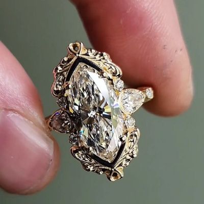 2.72Carats Marquise Zircon Engagement Ring with Pear Side Stones And Gold Scrollwork