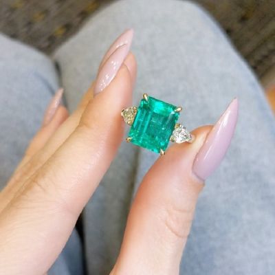 6.72 Carat Emerald Zircon Three Stone Ring