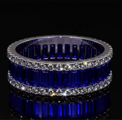 6.25ct Emerald Cut Blue Zircon Eternity Ring