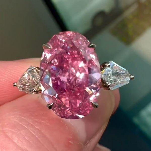 6.21 Carats Oval Cut Fancy Pink Natural Zircon Three Stone Ring